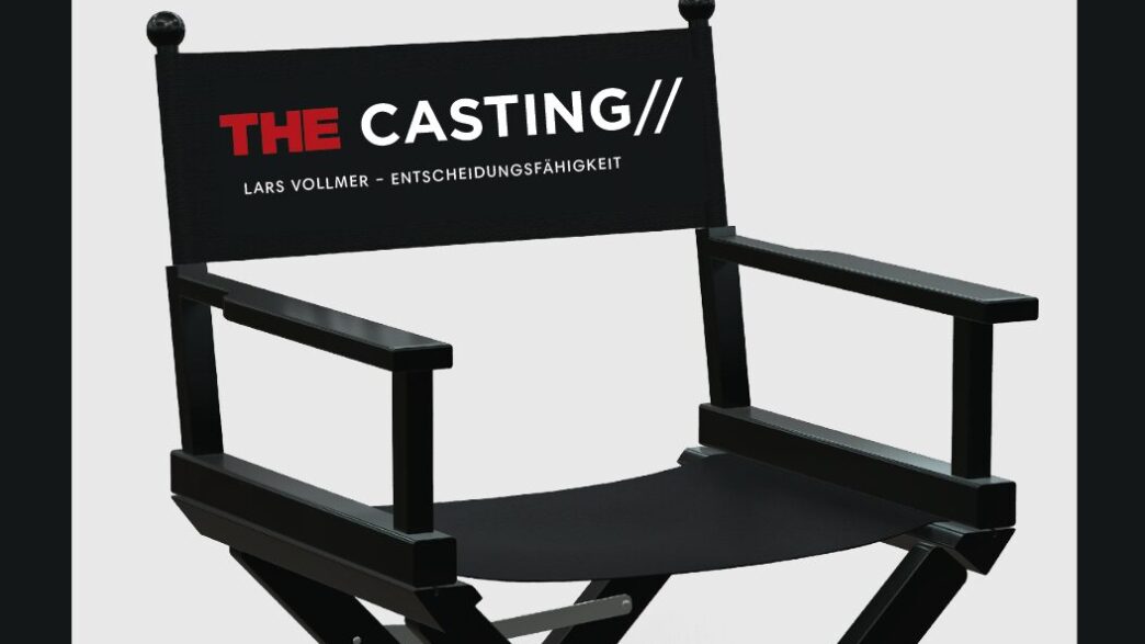 Black director's chair with a backrest banner reading THE CASTING in red and white, used for film auditions.