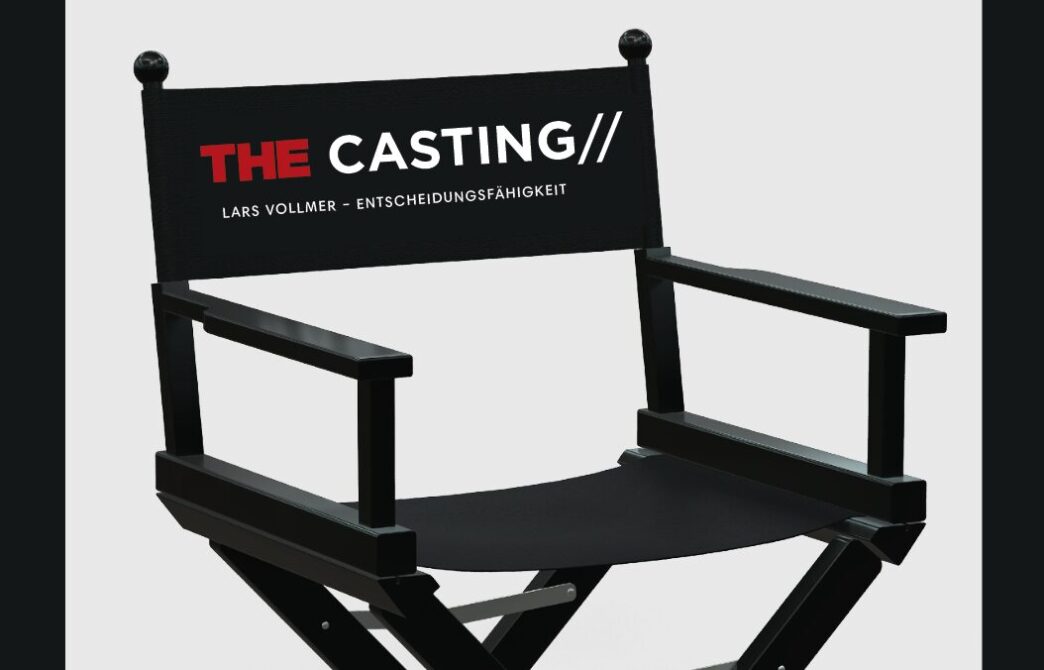 Black director's chair with a backrest banner reading THE CASTING in red and white, used for film auditions.