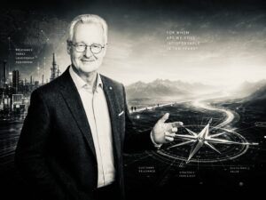 Portrait of a smiling man in a suit before a futuristic landscape with a compass, symbolizing leadership and foresight in business.